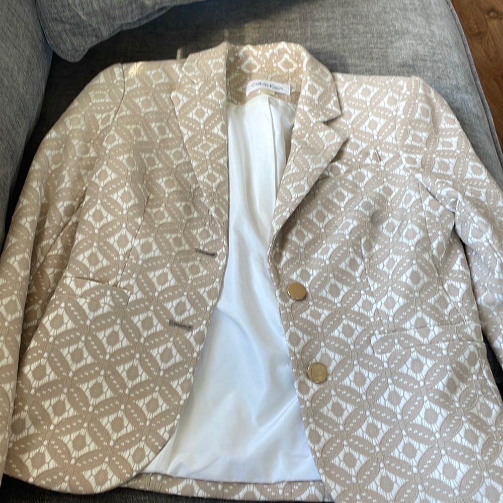 Calvin Klein tan lace blazer sz 2. In good shape has extra button